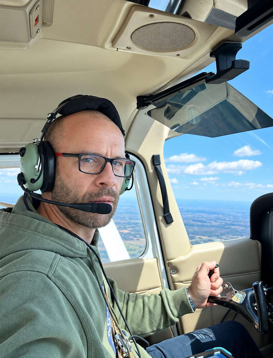 Aureliano Basso flying an airplane above Virginia