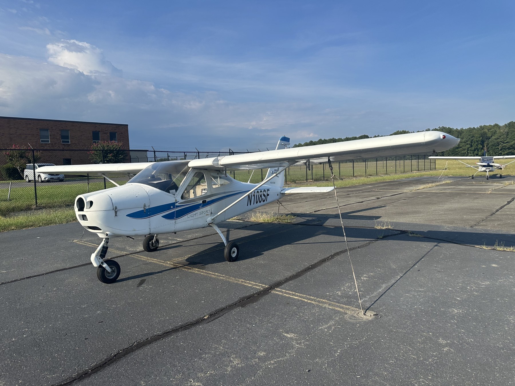 The Tecnam P92 used for my first solo, later sitting on the ramp with its engine removed